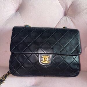 Chanel Black mini Lambskin Quilted Crossbody Bag with Gold Clasp